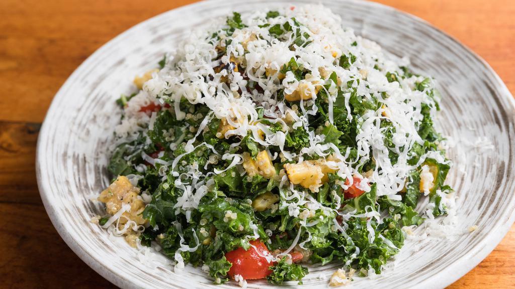 Kale Greens · Kale, quinoa, tomato, white cheddar, corn, roasted garlic miso dressing.