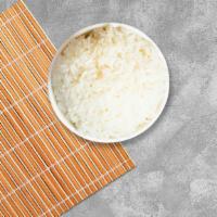 Steamed White Rice · Freshly steamed white rice.