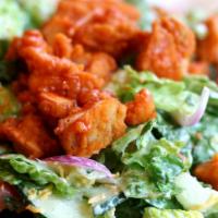Buffalo Chicken Salad · Chicken strips tossed in buffalo sauce, romaine lettuce, garlic croutons, parmigiana cheese,...