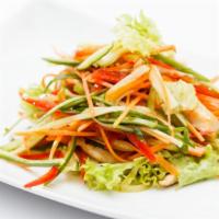 Asian Chopped Salad · Spinach, romaine lettuce, mandarin orange, green peas, carrots, red onions, grilled tofu, an...