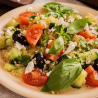 Mediterranean Quinoa Salad · Kale, cucumber, corn, feta cheese, red onions, green peppers, cherry tomatoes.