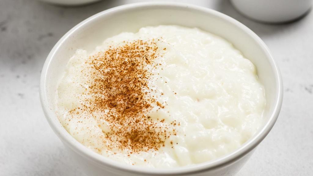 Rice Pudding · Sweet rice in creamy sauce.
