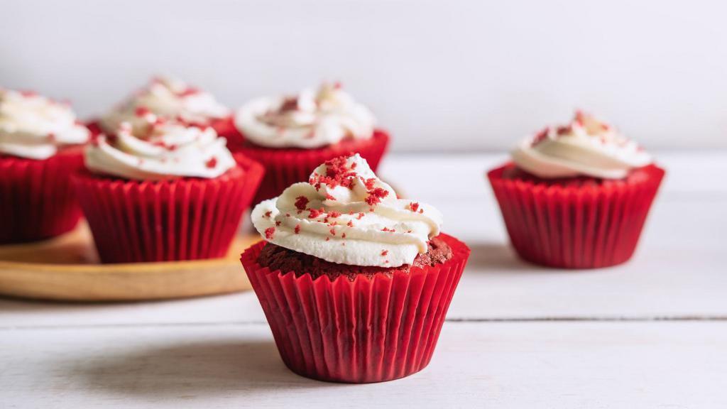 Red Velvet Cupcake · Moist red velvet cupcake with creamy frosting.