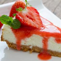 Strawberry Cheesecake · Creamy cheesecake with strawberries.