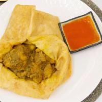 Goat Roti · Served with Potato and Channa