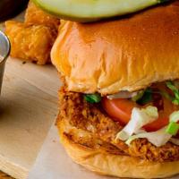 Original Hot Chicken Sandwich · Crispy, fried free range chicken served on a potato bun with pickles and cole slaw.
