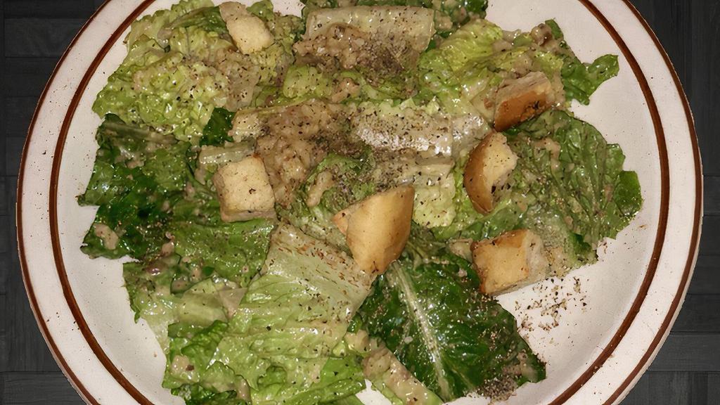 Caesar Salad · Popular. Romaine Lettuce with garlic and anchovies.