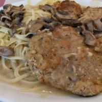 Veal Marsala · Breaded veal cutlet with mushrooms and marsala-wine butter sauce.