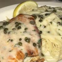 Fresh Fish Piccata · With capers, spinach, bacon, mushrooms, garlic, and a white wine butter sauce.