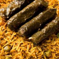 Grape Leaves (ورق عنب) Small (4Ps) · Grape leaves stuffed with rice, simmered in tomato sauce (Vegan & Gluten-Free)
