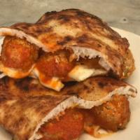 Panino Meatball · Veal meatball with mozzarella cheese and tomato sauce.