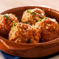 Polpettine Di Vitello · Classic Italian veal meatballs in a tomato sauce.