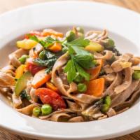 Fettuccine Integrali Vegertariane · Homemade whole wheat pasta with mixed vegetable.