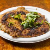 Chapli Kabab · Ground chicken blended with spices and fried khyberi style.