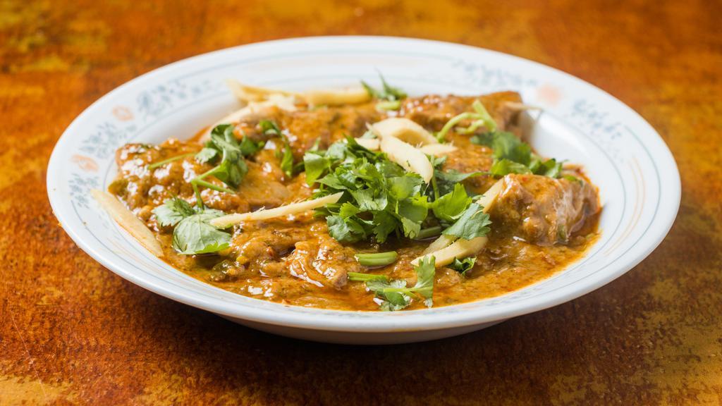 Chicken Karahi · Chicken pieces cooked with fresh tomatoes, green chiles, ginger and other spices and herbs.
