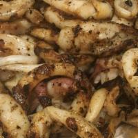 Grilled Calamari · Lightly charred squid with a bit of olive oil, sea salt, and lemon.