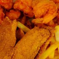 Fish, Shrimp, & Chips · 2 pieces of fish & 4 pieces of shrimp with seasoned steak cut French fries. Served w / Fried...