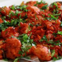 Chicken 65 · Most popular. Cubes of chicken cooked in spicy red sauce with whole red chiles and curry lea...