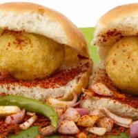 2 Vada Pao · Fried seasoned potato balls served in a bun with tangy sweet and spicy chutney.