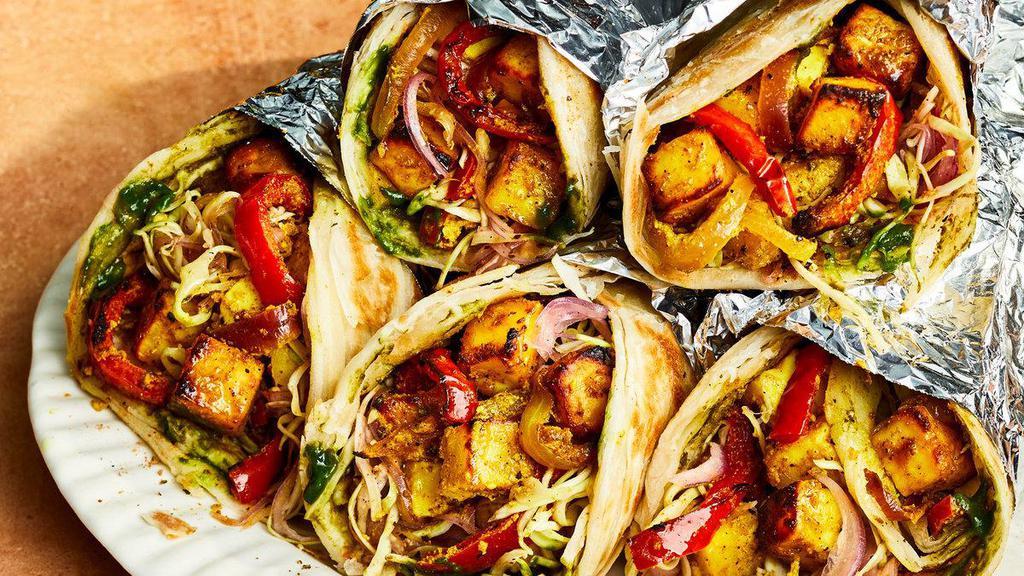 Paneer Kati Roll · Nanak paneer soured with onions, peppers, tomatoes and herbs rolled in fresh naan.