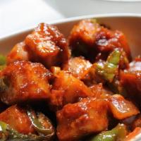 Chili Paneer Dry · Battered paneer stir fried in ginger, garlic, dried chilies and soya.