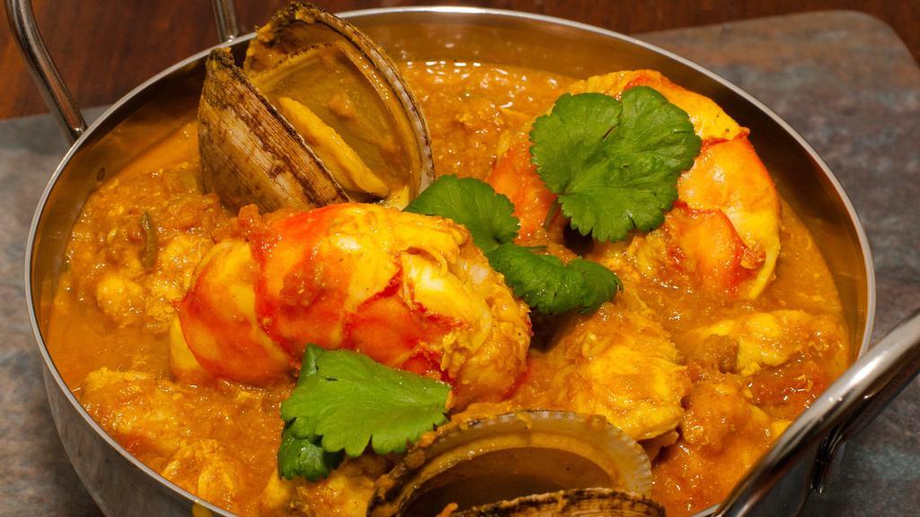 Fish Goan Curry · Filet of fresh fish with ginger, garlic, mustard seed, curry leaf and coconut milk.
