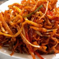 Chinese Bhel · Crispy noodles with finely chopped cabbage, onions, tomatoes, cilantro and scallions topped ...
