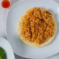 Arepas Con Pechuga Desmechada · Grilled corn cake with shredded chicken breast.