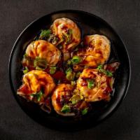 D8 Sweet And Spicy Jiaozi · Steamed dumplings with homemade spicy and sweet sauce with choice of protein