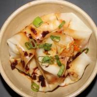 V2 Sweet And Spicy Veggie Wontons · Steamed wontons in a homemade spicy and sweet sauce