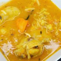 Curry Chicken · Boneless chicken thighs marinated in authentic Jamaican curry powder, carrots, potatoes, spi...