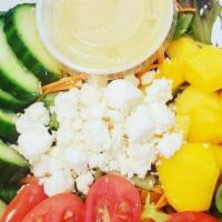 Sunshine Salad · Springmix, cucumber, cherry tomatoes, carrots, mangoes and crumbled feta cheese. Served with...
