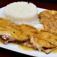 Lomo De Cerdo Hawaiiano · Lomo de cerdo asado con piña y queso mozzarella 
Grilled pork loin topped with pineapple and...