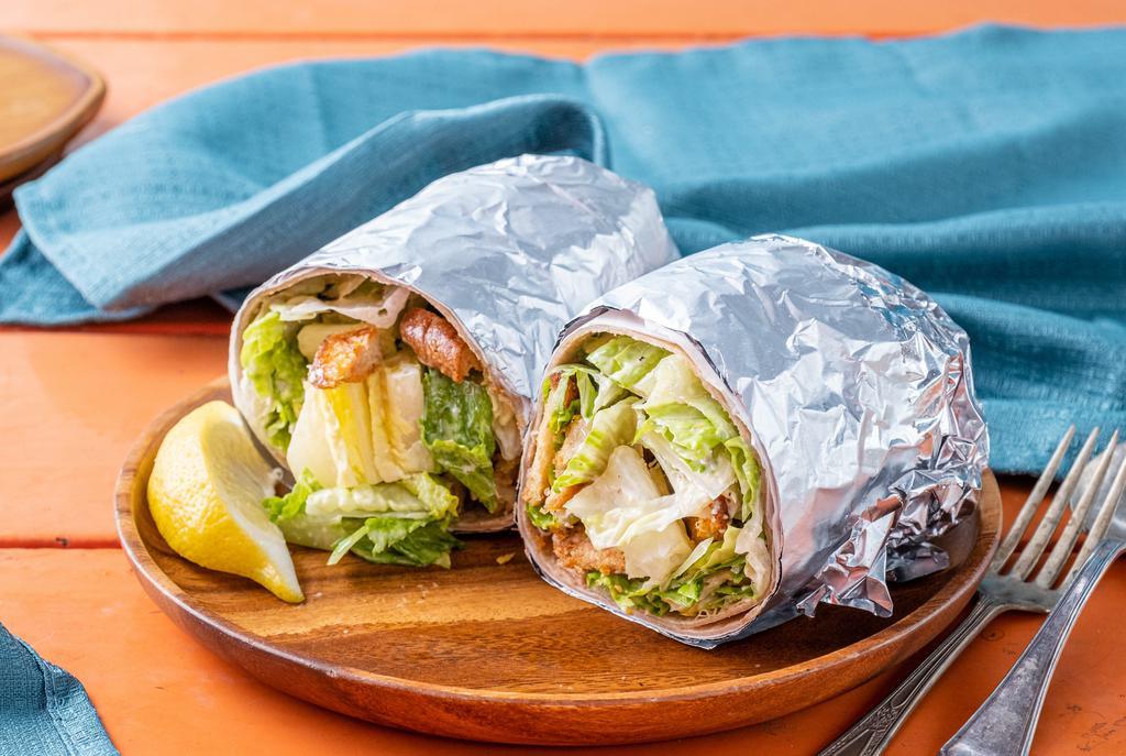 Chicken Caesar Wrap Sandwich · Delicious Wrap made with Grilled chicken, Romaine lettuce, Parmesan cheese, and caesar dressing.