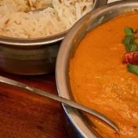 Chicken Tikka Masala · Clay oven cooked white meat, tomato light cream sauce. Served with Basmati rice.