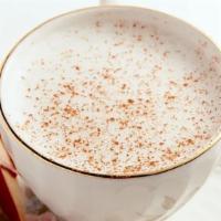 Honey Cinnamon Latte · Latte with honey added to the hot cup before espresso and steamed milk are poured. A dusting...