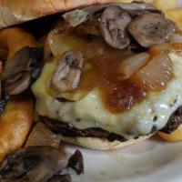 Swiss Steakburger · With sautéed mushrooms, onion rings, and steak fries.