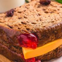 Bun And Cheeese · Using the finest ingredients, this soft, dark, sweet bread boasts a mix of fruits and raisin...