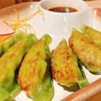 Vegetable Gyoza · Dumpling with a minced filling.