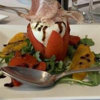Burrata · HOMEMADE FRESH SOFT MOZARELLA, OVER MIXED GREENS, ROASTED PEPPERS, TOMATO, OLIVE OIL, BALSAM...