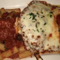 Veal Parmigiano · Rack of veal, pounded thin, parmigiano style.