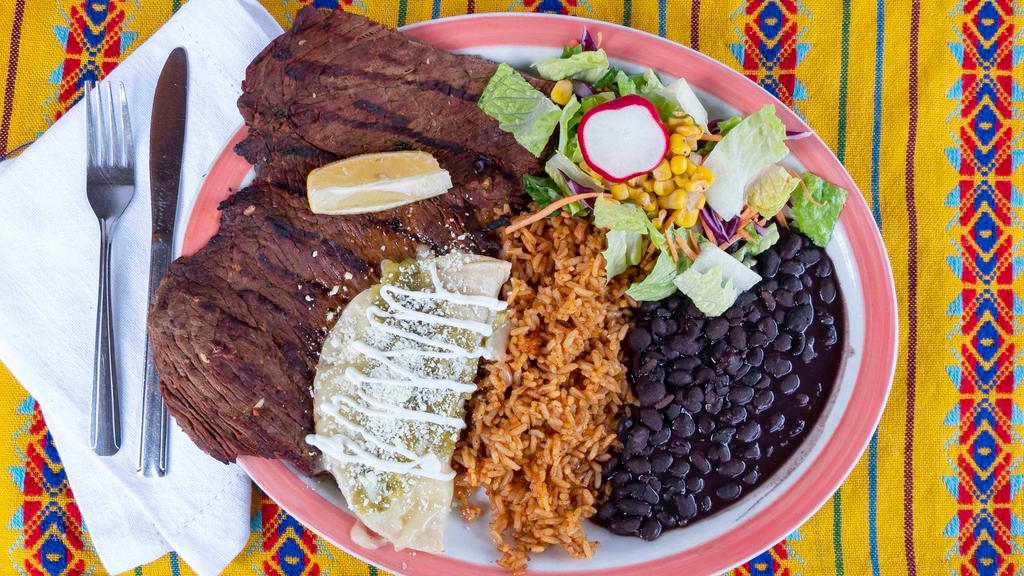 Steak Tampiqueno Platter · Served with Mexican rice, black beans, side salad and 1 green sauce cheese enchilada. Sour cream on the side.