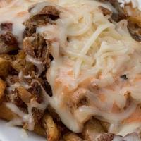 Gyro Gyro Fries · hand cut fries topped with pork gyro, melted mozzarella cheese & our pink sauce (G)