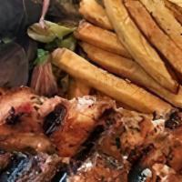 Chicken Souvlaki Platter (Halal) · chunks of grilled, marinated chicken served with house salad & choice of Rice or Fries. Tzat...