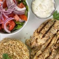 Grilled Chicken Breast Platter (Halal) · fresh grilled chicken breast served with house salad & choice of Rice or Fries. Tzatziki & p...