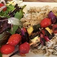 Grilled Veggie Souvlaki Platter · grilled marinated zucchini, squash, tomatoes, Green Peppers & onions served with house salad...