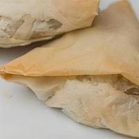 Spanakopita · spinach & feta cheese wrapped in phyllo pastry (V)