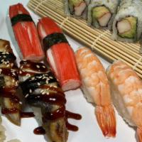 Cooked Delight · 8 pcs of California roll, 2 pcs of crab meat nigiri, 2 pcs of shrimp nigiri, and 2 pcs of Ee...