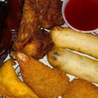 Pu Pu Platter · Two chicken wing, two fried jumbo shrimp, two vegetable roll, cheese wonton, two spare ribs.