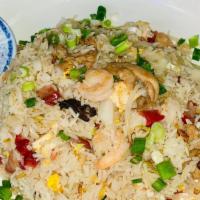 Young Chow White Fried Rice · House  Special White fried rice.
Pork, shrimp ,beef and chicken.